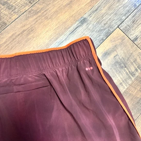 Saucony Women's Athletic Shorts in Maroon and Orange - Picture 5 of 6